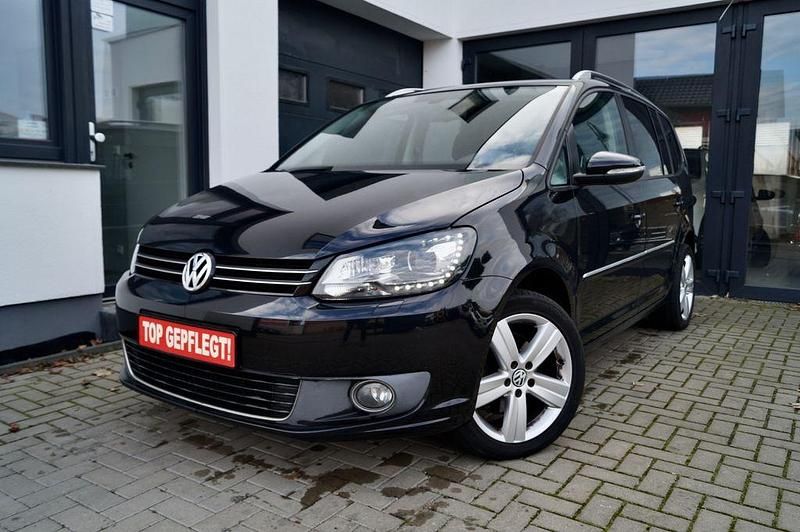 Schwarz Gebraucht 2011 VW Touran Highline Van / Kleinbus | 11.990 € (Etwas zu teuer) - Bild 1/4