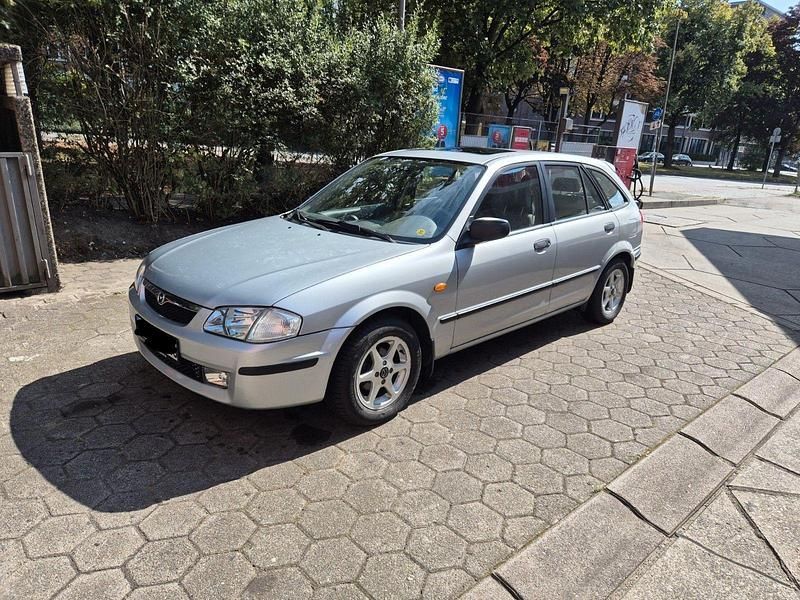 Silber Gebraucht 1999 Mazda 323F Exclusive Limousine | 1.200 € - Bild 1/4
