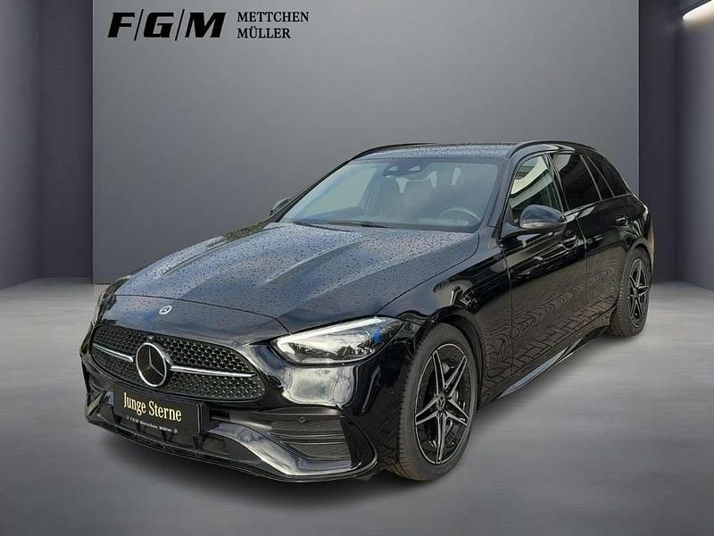 Obsidianschwarz metallic Gebraucht 2024 Mercedes C220 AMG line Kombi | 42.890 € (Teuer) - Bild 1/4