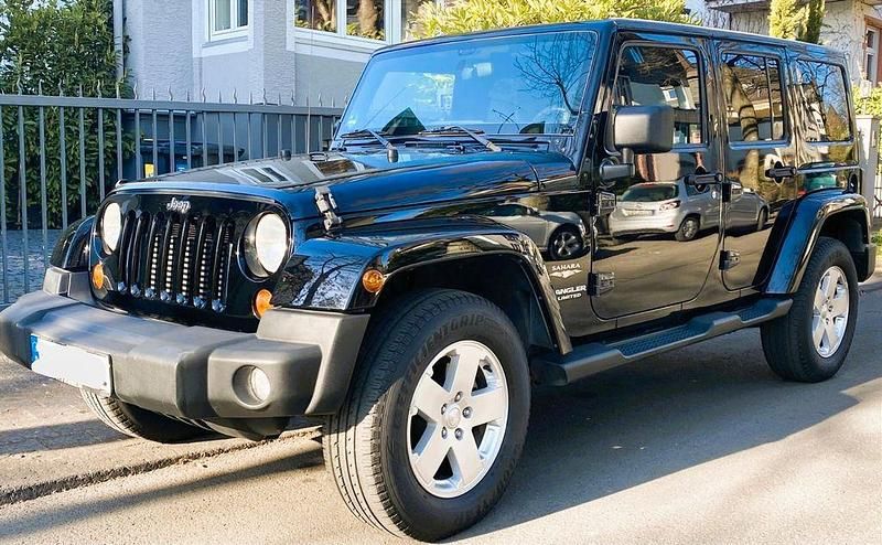 Schwarz Gebraucht 2012 Jeep Wrangler Sahara SUV | 26.700 € (Fairer Preis) - Bild 1/4