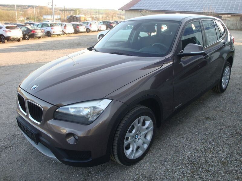 Braun Gebraucht 2013 BMW X1 Sport Line SUV | 6.950 € (Guter Preis) - Bild 1/4