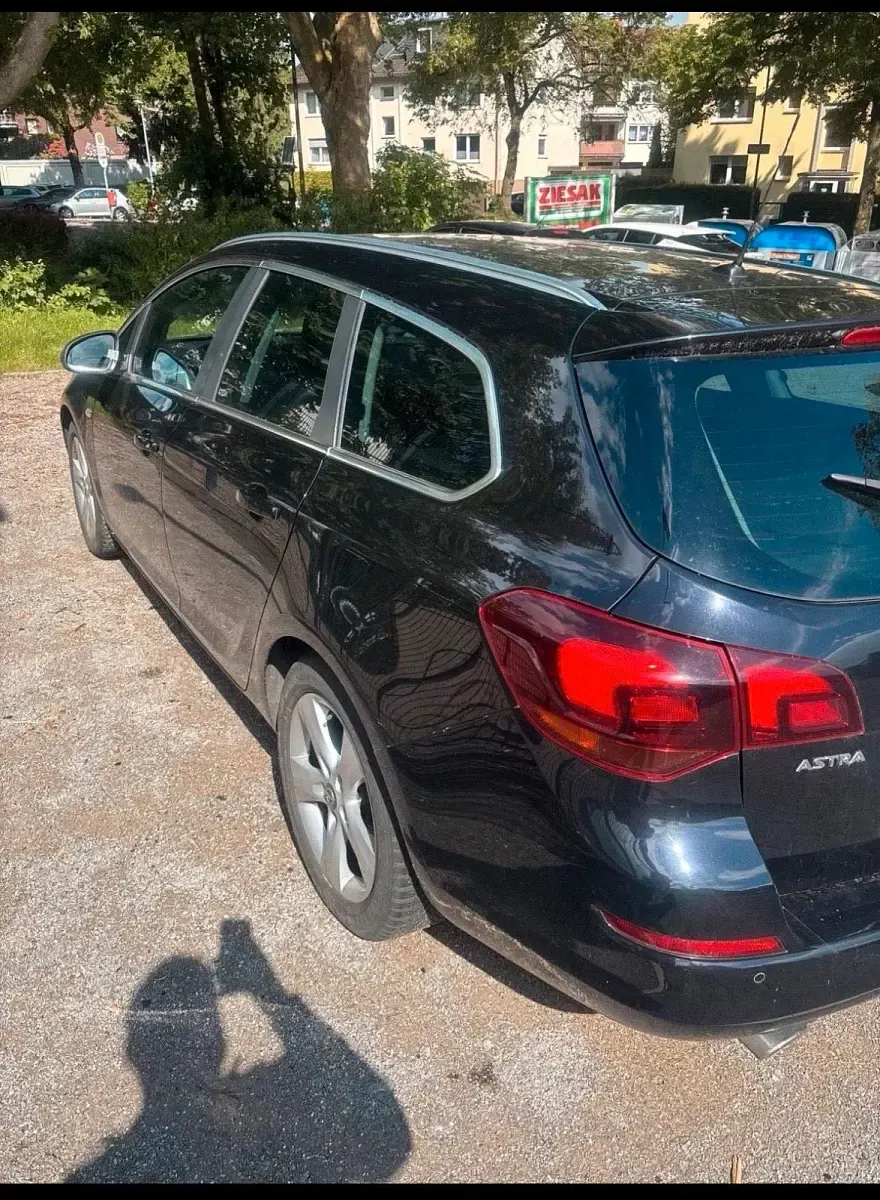Gebraucht Opel Astra 180 PS (132 kW) 2011 Schwarz Kombi