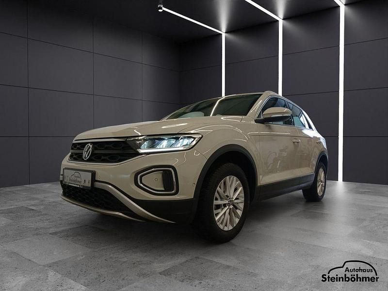 Ascotgrau (grau) Gebraucht 2024 VW T-Roc Life SUV | 26.435 € (Guter Preis) - Bild 1/4
