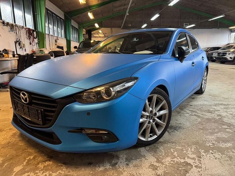 Grau Gebraucht 2017 Mazda 3 Exclusive-Line Limousine | 9.195 € (Guter Preis) - Bild 1/4