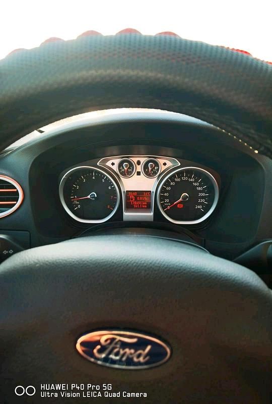 Second-hand Ford Focus 104 CP (76 kW) 2010 Alb Coupe