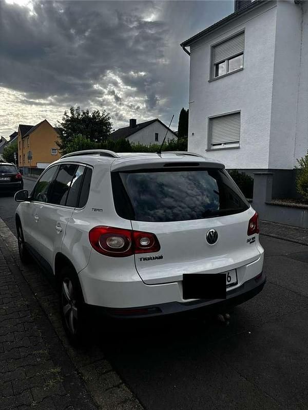Candyweiss Gebraucht 2011 VW Tiguan Team SUV | 8.200 € (Fairer Preis) - Bild 1/4