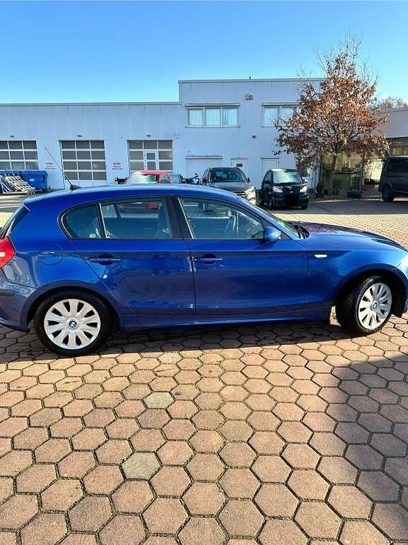Second-hand BMW 116 122 CP (89 kW) 2009 Albastru Hatchback