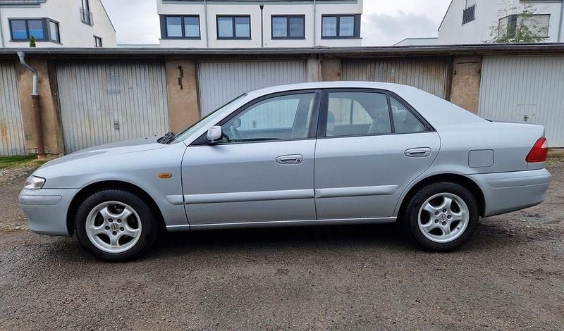 Grau Gebraucht 2000 Mazda 626 Limousine | 3.987 € (Teuer) - Bild 1/4