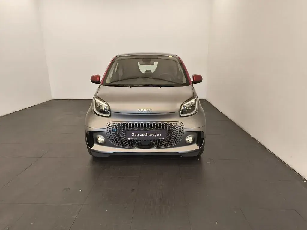Gebraucht Smart ForTwo Electric Drive Exclusive 60 kW (82 PS) 2024 Bodypanels in titania grey (matt) Coupé