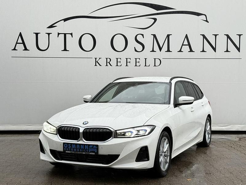 Alpinweiss iii Gebraucht 2023 BMW 318 Sport Line Kombi | 31.950 € (Fairer Preis) - Bild 1/4