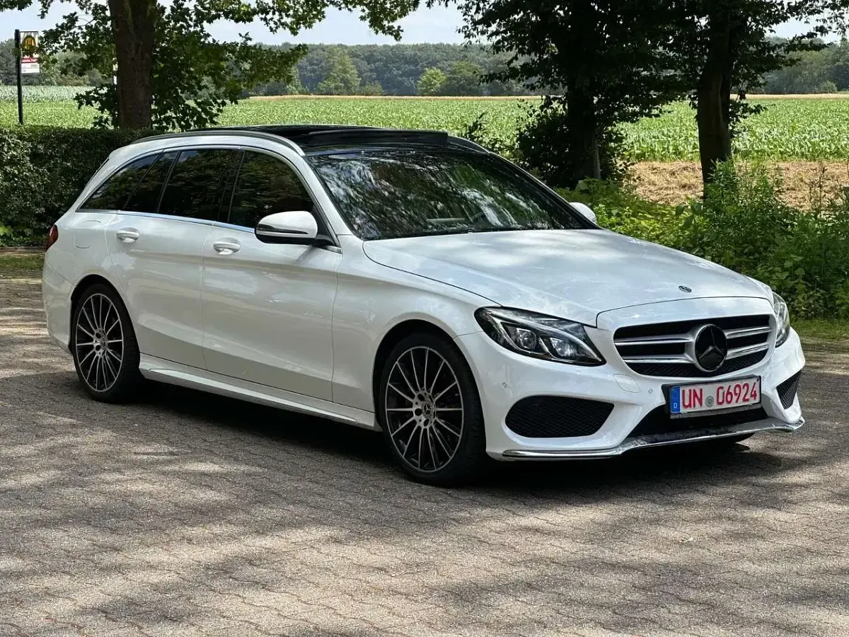 Gebraucht Mercedes C250 AMG line 204 PS (150 kW) 2016 Polarweiss  unilack Kombi