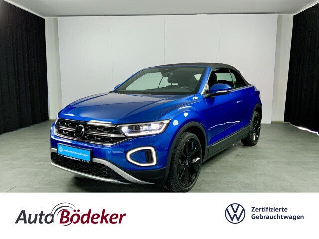 Ravennablau Gebraucht 2024 VW T-Roc Cabriolet Style Cabrio | 34.990 € (Fairer Preis) - Bild 1/4