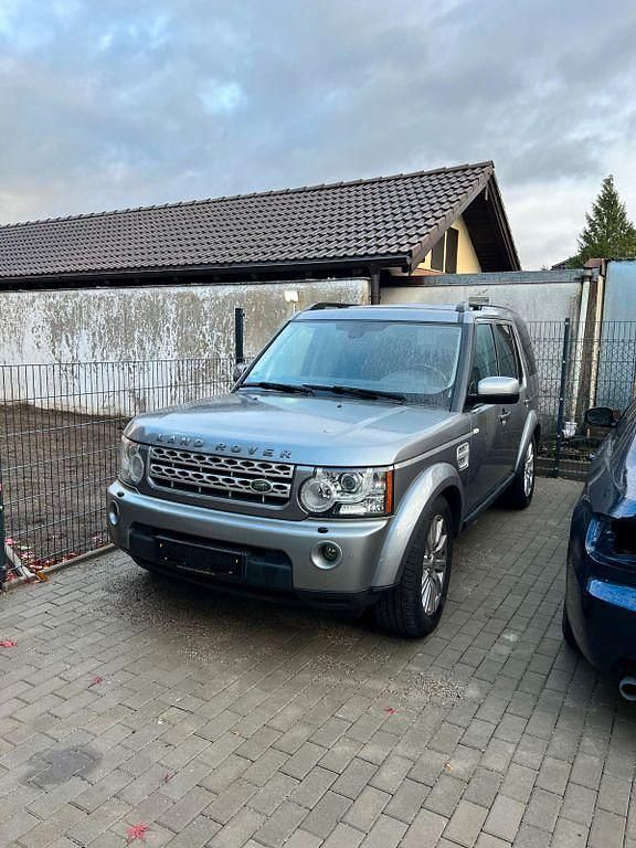 Grau Gebraucht 2013 Land Rover Discovery 4 HSE SUV | 13.999 € - Bild 1/4