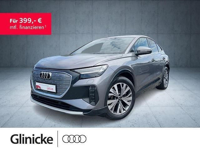 Taifungrau metallic Gebraucht 2022 Audi Q4 Sportback e-tron Ambiente SUV | 29.970 € (Fairer Preis) - Bild 1/3