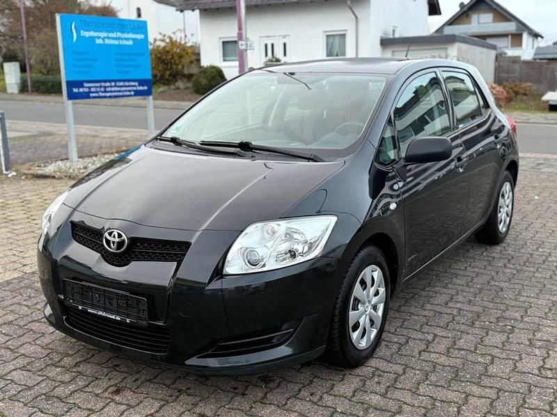 Black mica / ink Gebraucht 2010 Toyota Auris Limousine | 2.600 € (Fairer Preis) - Bild 1/4