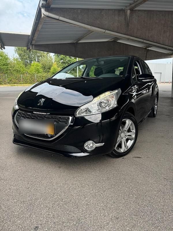Schwarz Gebraucht 2013 Peugeot 208 Kleinwagen | 3.599 € - Bild 1/4