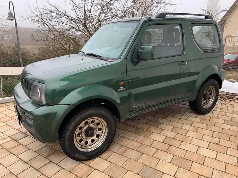 Grün Gebraucht 2012 Suzuki Jimny SUV | 10.499 € (Fairer Preis) - Bild 1/1