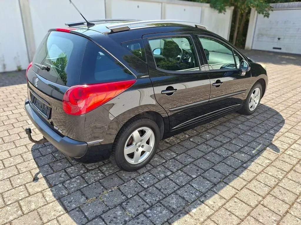 Gebraucht Peugeot 207 Premium 95 PS (69 kW) 2010 Schwarz Kombi