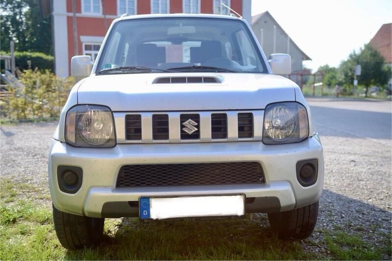 Silber Gebraucht 2012 Suzuki Jimny SUV | 12.500 € (Fairer Preis) - Bild 1/4