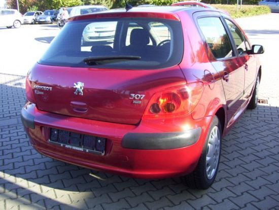 Gebraucht Peugeot 307 Tendance 107 PS (78 kW) 2002 Rot metallic Limousine