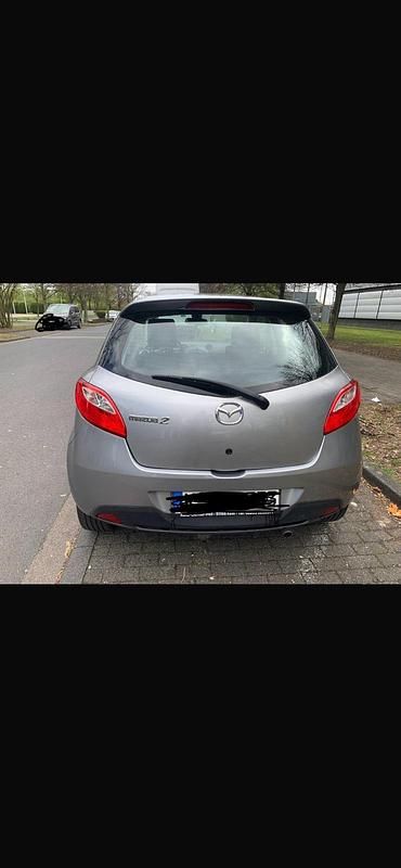 Gebraucht Mazda 2 Inclusive 88 PS (64 kW) 2010 Grau Kleinwagen