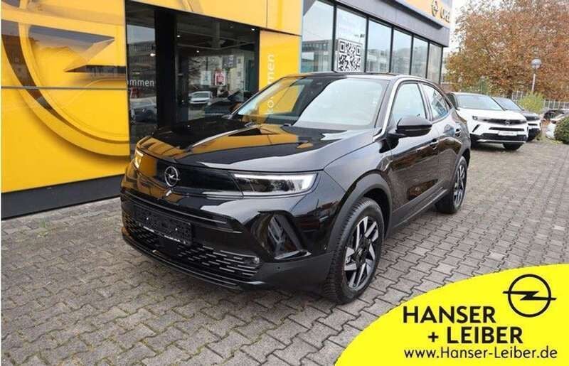 Karbon schwarz Gebraucht 2024 Opel Mokka Elegance SUV | 23.280 € (Fairer Preis) - Bild 1/4