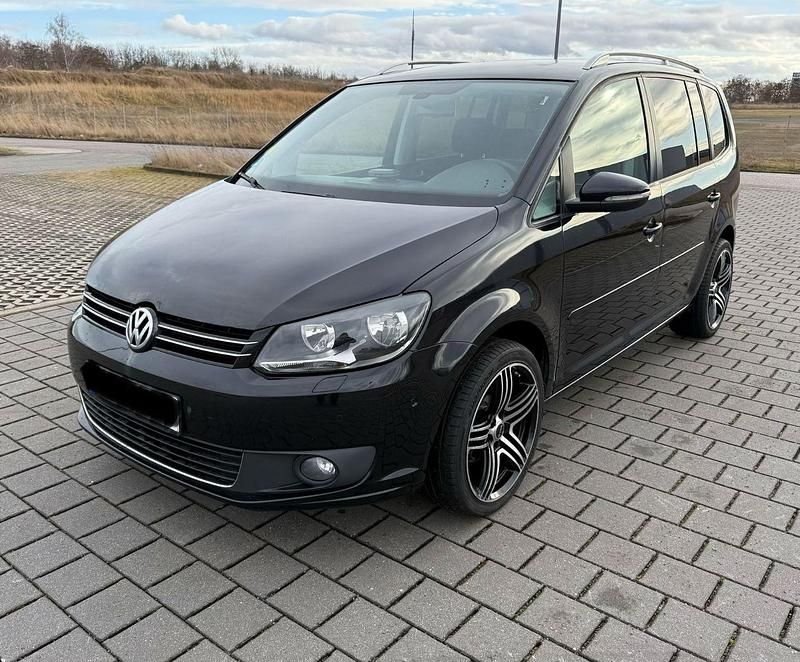 Gebraucht VW Touran Cup 105 PS (77 kW) 2014 Schwarz Van / Kleinbus
