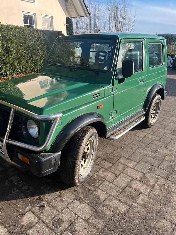 Grün Gebraucht 1998 Suzuki Samurai SUV | 4.890 € - Bild 1/4