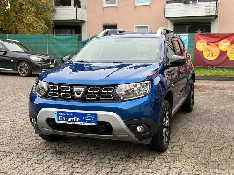 Blau Gebraucht 2020 Dacia Duster Celebration SUV | 13.190 € (Fairer Preis) - Bild 1/4