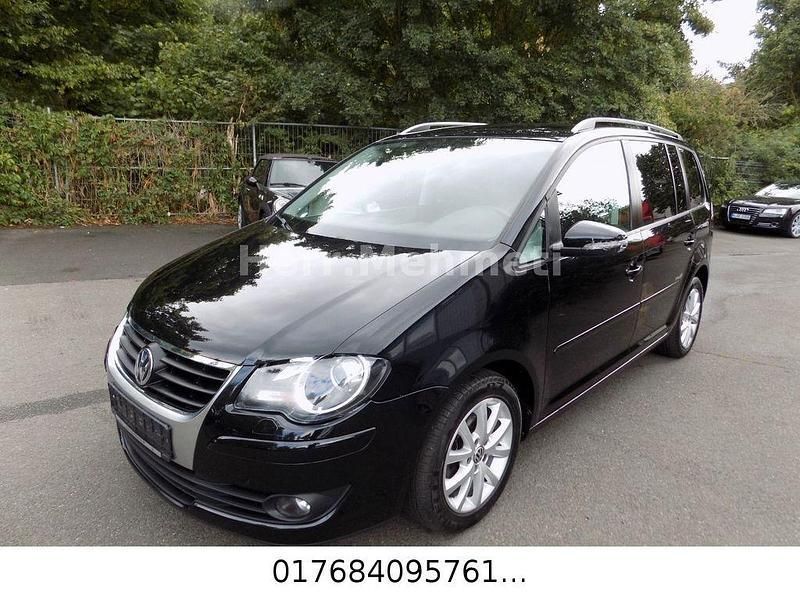 Schwarz Gebraucht 2010 VW Touran Freestyle Van / Kleinbus | 2.590 € (Superpreis) - Bild 1/4