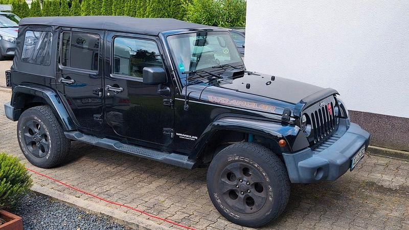 Schwarz Gebraucht 2016 Jeep Wrangler Sahara SUV | 25.900 € (Fairer Preis) - Bild 1/4
