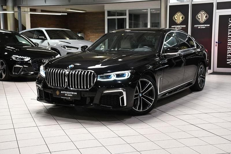Schwarz Gebraucht 2021 BMW 745e M Sport Limousine | 52.300 € (Fairer Preis) - Bild 1/4