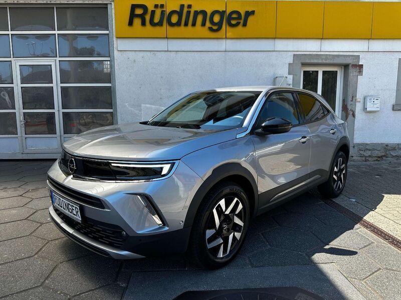 Grau Gebraucht 2023 Opel Mokka Elegance SUV | 18.480 € (Fairer Preis) - Bild 1/4