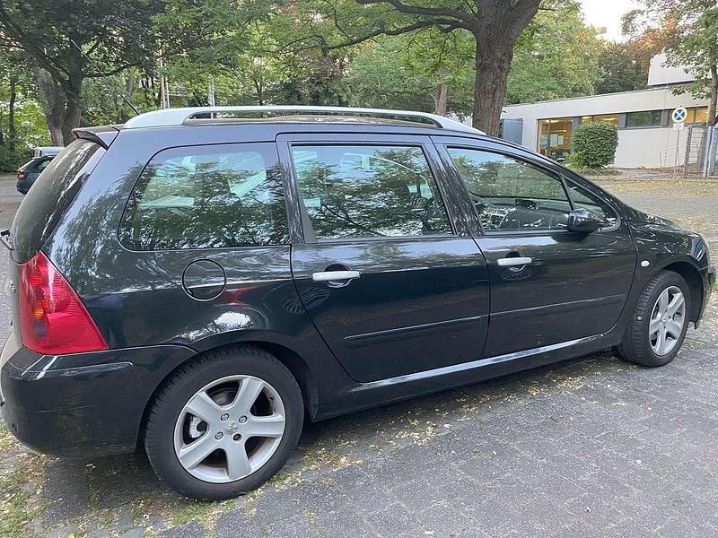 Schwarz Gebraucht 2004 Peugeot 307 Premium Kombi | 2.000 € (Fairer Preis) - Bild 1/4