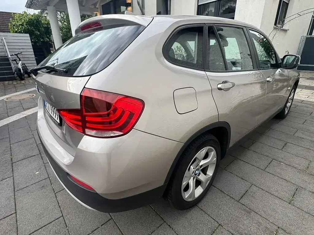 Używany BMW X1 204 KM (150 kW) 2009 Beżowy SUV
