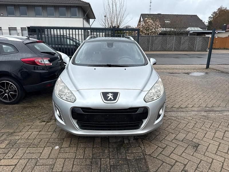 Gebraucht Peugeot 308 112 PS (82 kW) 2012 Schwarz Kombi