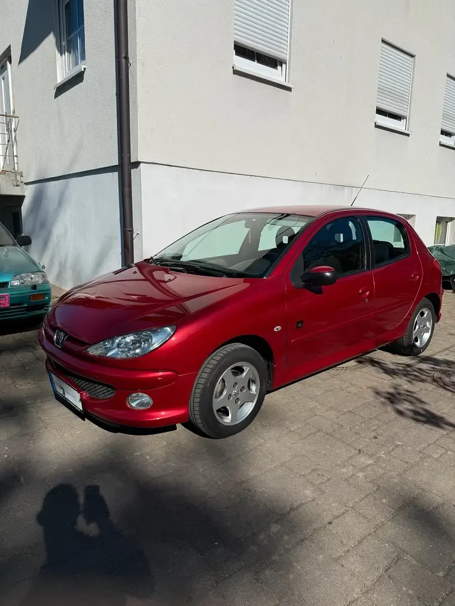Używany Peugeot 206 75 KM (55 kW) 2007 Czerwony Hatchback