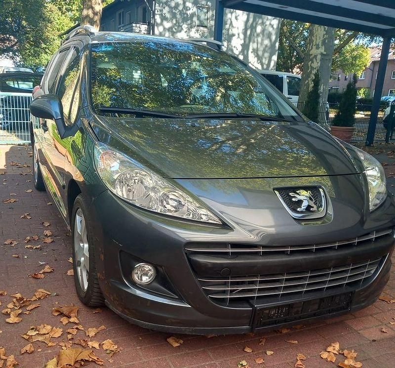 Gebraucht Peugeot 207 Premium 120 PS (88 kW) 2012 Grau Kombi