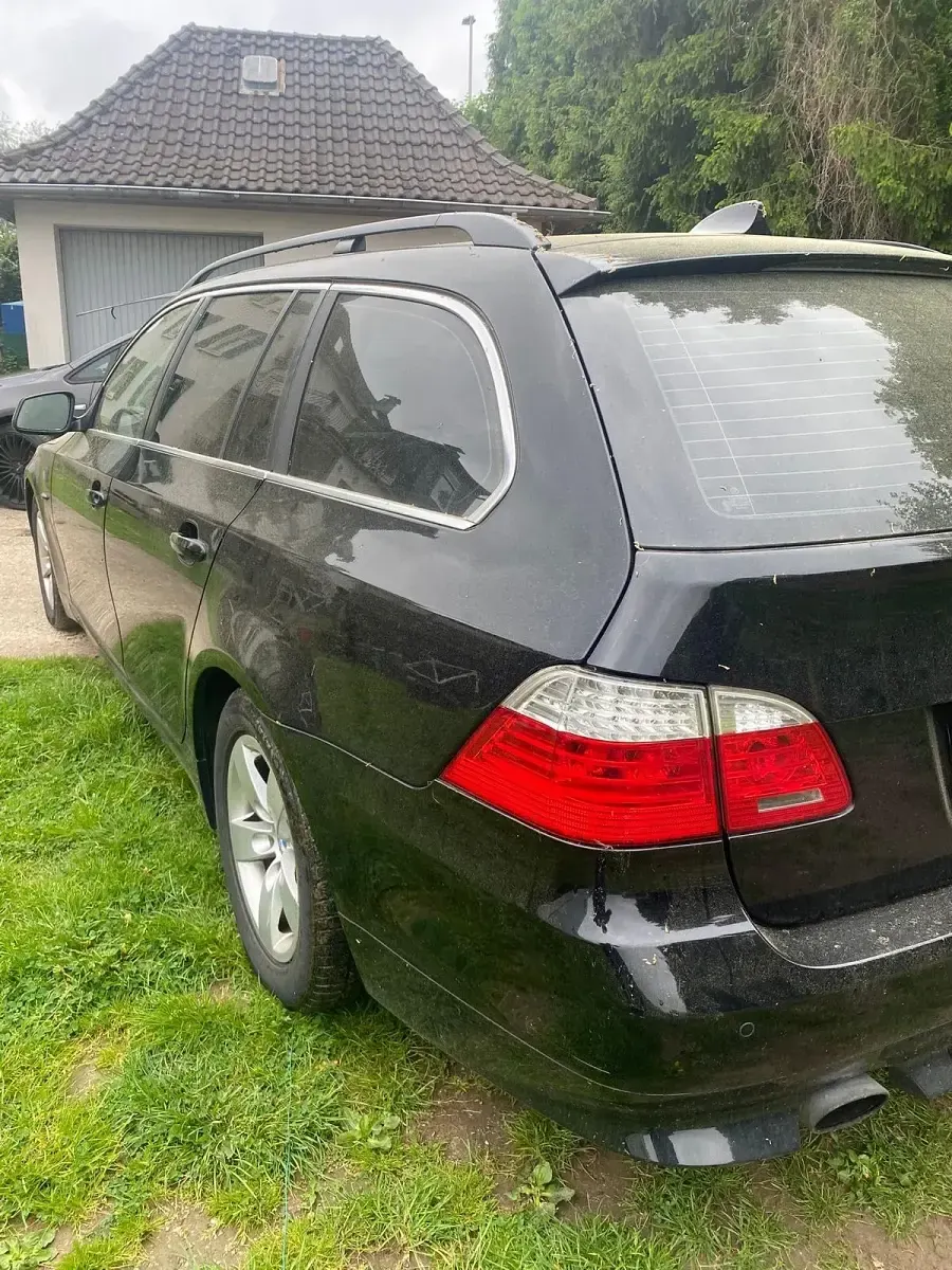 Second-hand BMW 520 163 CP (119 kW) 2009 Negru Break