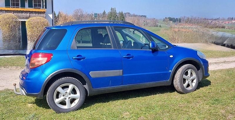 Gebraucht Suzuki SX4 107 PS (78 kW) 2009 Blau Limousine