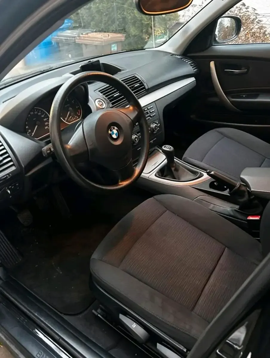 Używany BMW 116 115 KM (84 kW) 2010 Czarny Hatchback