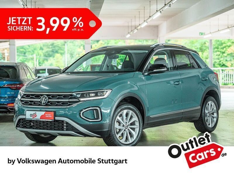 Petroleum blue metallic/schwar Gebraucht 2023 VW T-Roc Style SUV | 27.830 € (Fairer Preis) - Bild 1/3