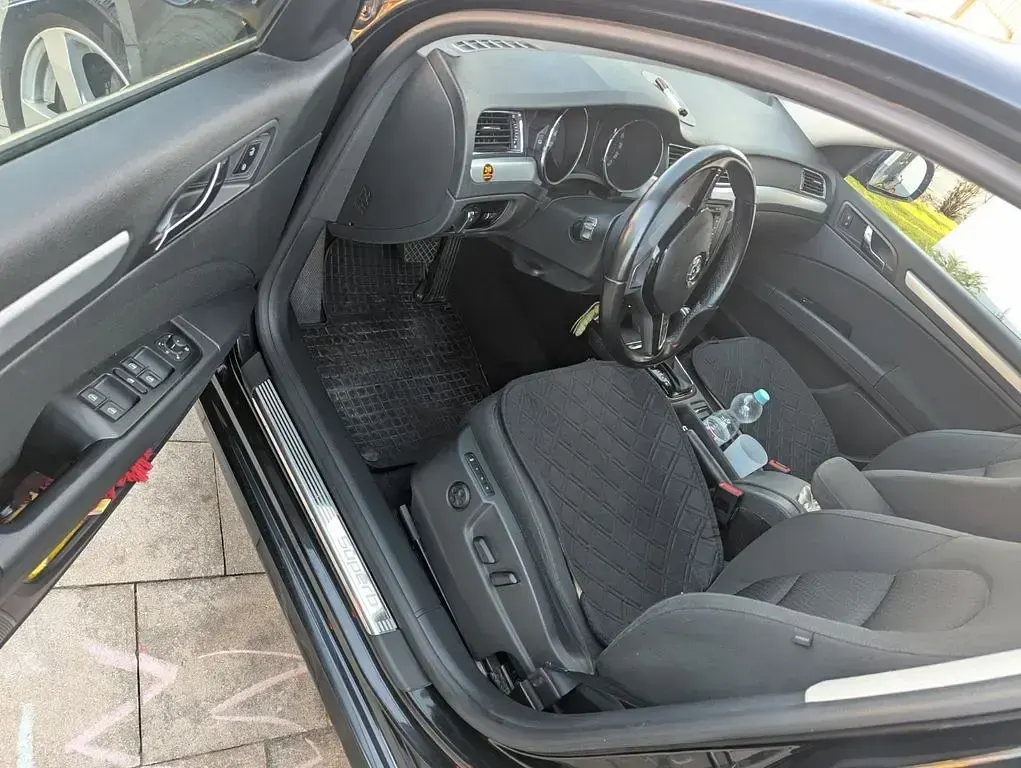 Używany Skoda Superb Elegance 140 KM (102 kW) 2015 Czarny Kombi