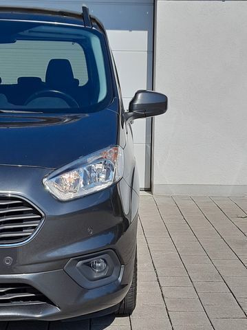 Magneticgrau (metallic) Gebraucht 2020 Ford Tourneo Courier Titanium Van / Kleinbus | 16.999 € (Etwas zu teuer) - Bild 1/4