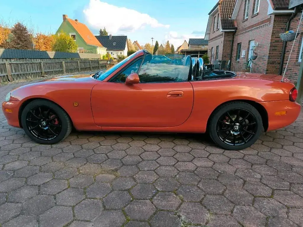 Używany Mazda MX5 110 KM (80 kW) 2005 Pomarańczowy Kabriolet