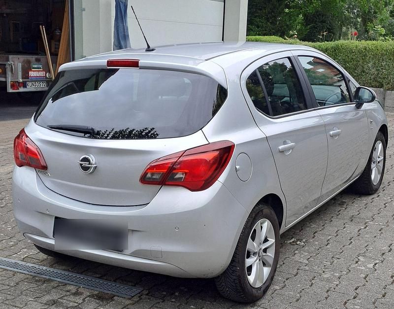 Second-hand Opel Corsa drive 90 CP (66 kW) 2015 Argintiu Hatchback