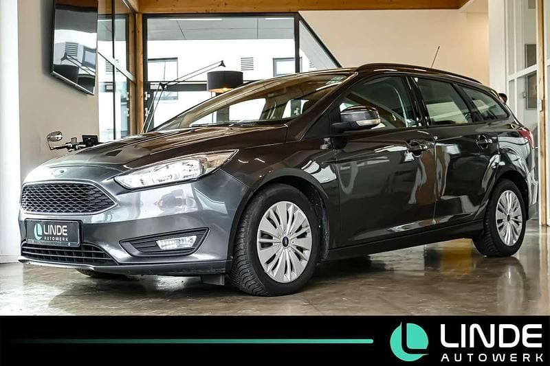Magneticgrau (metallic) Gebraucht 2016 Ford Focus Trend Kombi | 5.390 € (Superpreis) - Bild 1/4