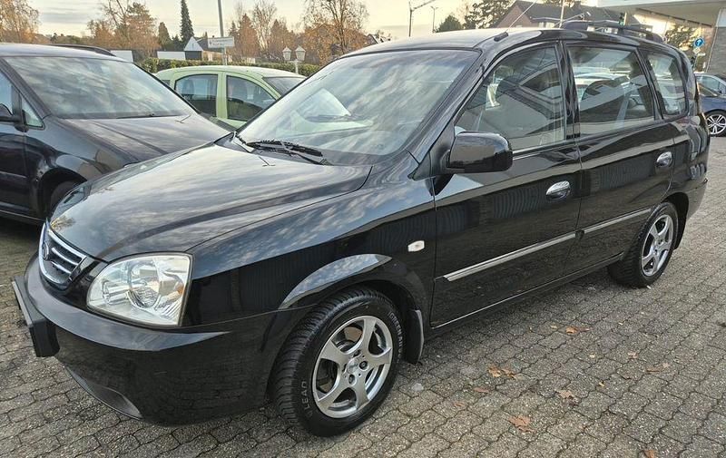 Schwarz Gebraucht 2005 Kia Carens EX Van / Kleinbus | 3.490 € - Bild 1/4
