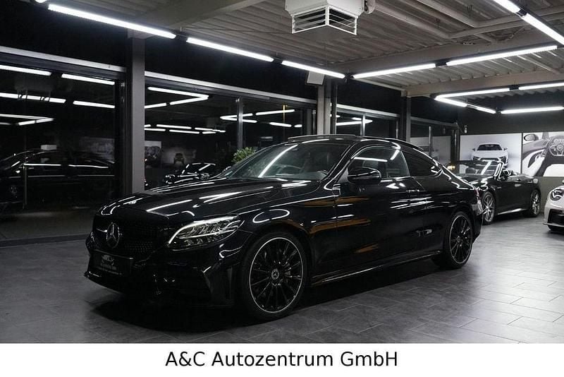 Schwarz Gebraucht 2021 Mercedes C300 AMG line Coupé | 29.990 € (Superpreis) - Bild 1/4