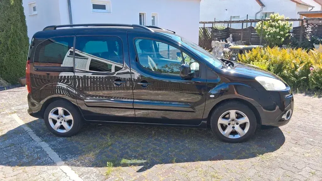 Gebraucht Peugeot Partner Tepee 114 PS (83 kW) 2012 Schwarz Van / Kleinbus